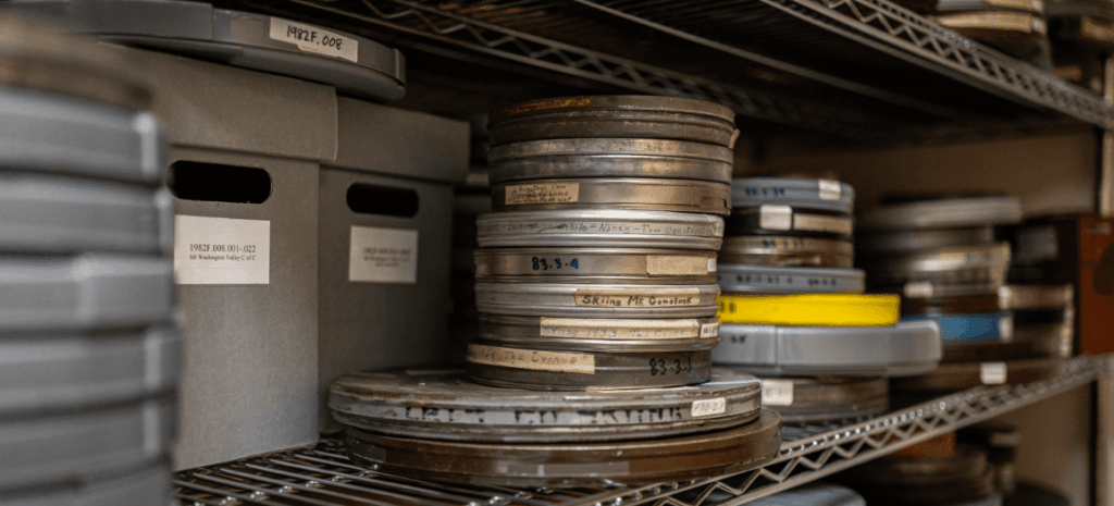 Film canisters on a shelf